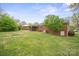 Brick house backyard with grass at 303 Windy Rush Rd, Kannapolis, NC 28081