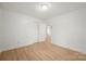A bedroom with a closet and doorway at 303 Windy Rush Rd, Kannapolis, NC 28081