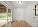 Bonus room features sliding glass doors and a side entrance door to the house at 303 Windy Rush Rd, Kannapolis, NC 28081