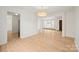 Bright living room features beautiful floors, natural light, and an open floor plan at 303 Windy Rush Rd, Kannapolis, NC 28081