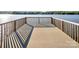 Beautiful deck overlooking the lake and mountains; relaxing outdoor space for leisure and entertainment at 338 Fairfield Ct, Mount Gilead, NC 27306