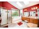 Bathroom showcasing a walk-in shower, soaking tub, dual vanity sinks, and bright skylights at 3409 Pondview Ln, Charlotte, NC 28210