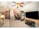 Multi-functional bonus room featuring a workspace, seating area, and entertainment setup at 3409 Pondview Ln, Charlotte, NC 28210