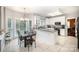 Breakfast nook with pendant lighting, granite counters, and a view to the outside at 3409 Pondview Ln, Charlotte, NC 28210