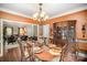 Cozy dining area with an open layout connected to the living room, ideal for entertaining at 3409 Pondview Ln, Charlotte, NC 28210