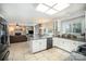 Bright, open kitchen with granite countertops, stainless steel appliances, and an island at 3409 Pondview Ln, Charlotte, NC 28210