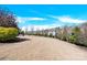 Spacious backyard with a lush green lawn, providing an ideal setting for outdoor activities and gatherings at 345 Somerled Way, Waxhaw, NC 28173