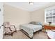 Bright bedroom with neutral walls, comfortable furniture and a large window providing natural light at 345 Somerled Way, Waxhaw, NC 28173