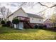 Large backyard featuring a deck with stairs and walkout basement access at 3704 25Th Street Ne Pl, Hickory, NC 28601