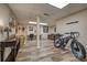 Finished basement features wood-look flooring, recessed lighting, and a work area at 3704 25Th Street Ne Pl, Hickory, NC 28601