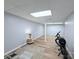 Partially furnished basement with light wood flooring and a cozy atmosphere at 3704 25Th Street Ne Pl, Hickory, NC 28601