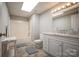 Bathroom features a shower-tub combo, vanity with sink, and tile flooring at 3704 25Th Street Ne Pl, Hickory, NC 28601