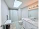 Bright bathroom with a tub/shower combination, white vanity, and neutral tile flooring at 3704 25Th Street Ne Pl, Hickory, NC 28601
