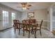 Elegant dining room featuring a wooden table, classic chairs, and decorative mirror at 3704 25Th Street Ne Pl, Hickory, NC 28601