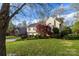 Charming two-story home with manicured lawn and mature landscaping at 3704 25Th Street Ne Pl, Hickory, NC 28601