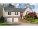 Charming two-story home with a two-car garage and well-manicured landscaping at 3704 25Th Street Ne Pl, Hickory, NC 28601