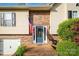 Inviting front entrance with a brick pathway, blue door, and sidelights at 3704 25Th Street Ne Pl, Hickory, NC 28601