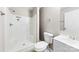 Bathroom featuring a shower-tub combo, toilet and vanity with chrome hardware at 416 E Park Ave, Gastonia, NC 28054