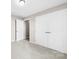 Bright bedroom featuring an entry door and a large wardrobe with double doors at 416 E Park Ave, Gastonia, NC 28054