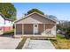 Charming home featuring neutral siding, a cozy front porch, and a well-manicured lawn at 416 E Park Ave, Gastonia, NC 28054