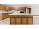 Spacious kitchen showcasing stainless appliances, granite countertops, and center island at 416 E Park Ave, Gastonia, NC 28054