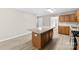 Kitchen island featuring stone countertop and stainless appliances at 416 E Park Ave, Gastonia, NC 28054