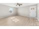 Inviting living room showcasing modern flooring, ample natural light, and a welcoming entry door at 416 E Park Ave, Gastonia, NC 28054