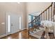 Inviting foyer with hardwood floors, staircase, and a bright, welcoming entrance at 4231 Brushy Knl, York, SC 29745