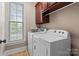 Bright laundry room with modern washer and dryer appliances at 4231 Brushy Knl, York, SC 29745