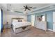 Tranquil main bedroom boasts tray ceiling, textured wall, and a luxurious neutral color palette at 4231 Brushy Knl, York, SC 29745