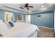 Spacious main bedroom offers a peaceful retreat with a ceiling fan, and neutral toned walls at 4231 Brushy Knl, York, SC 29745