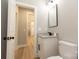 Modern bathroom features white cabinets, granite countertop, and neutral paint scheme at 472 Oak Rd # 114/115/116, Norwood, NC 28128