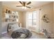 bedroom with unicorn decor, bed and shelving against a window at 472 Oak Rd # 114/115/116, Norwood, NC 28128