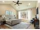 Staged bedroom featuring a vaulted ceiling, neutral color palette, and large windows at 472 Oak Rd # 114/115/116, Norwood, NC 28128