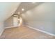 Large bonus room with neutral walls and carpet features recessed lighting and an access door at 472 Oak Rd # 114/115/116, Norwood, NC 28128