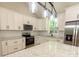 Bright kitchen featuring stainless steel appliances, granite countertops, and modern lighting at 472 Oak Rd # 114/115/116, Norwood, NC 28128