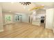 Bright and airy living room features hardwood floors and modern lighting fixtures at 472 Oak Rd # 114/115/116, Norwood, NC 28128