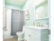 Bathroom featuring a shower/tub combo and a white vanity at 547 Ashby Dr, Davidson, NC 28036