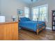 Bedroom with wood floors and natural light coming in from the window at 547 Ashby Dr, Davidson, NC 28036