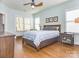 Bedroom with multiple windows for tons of natural light and hardwood flooring at 547 Ashby Dr, Davidson, NC 28036