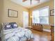 Bedroom with wood floors, a window, and light yellow colored walls at 547 Ashby Dr, Davidson, NC 28036