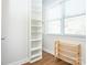 Walk in closet with built-in shelves and window for lots of light at 547 Ashby Dr, Davidson, NC 28036