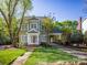 Charming two-story home with a well-manicured lawn, inviting entrance, and convenient covered carport at 547 Ashby Dr, Davidson, NC 28036