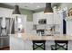 Beautiful kitchen featuring granite countertops, white cabinets, and stainless steel appliances at 5854 Crimson Oak Ct, Harrisburg, NC 28075