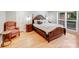 Cozy bedroom with a classic bed frame, soft lighting, and a tranquil atmosphere at 6730 Gold Wagon Ln, Mint Hill, NC 28227