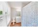 Bright bathroom featuring a shower, toilet, and sink, providing essential amenities with natural light and space at 6730 Gold Wagon Ln, Mint Hill, NC 28227