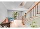 Inviting foyer with hardwood floors, stairs and natural light at 6730 Gold Wagon Ln, Mint Hill, NC 28227