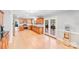 Open-concept kitchen with hardwood floors and updated appliances, perfect for cooking and entertaining at 6730 Gold Wagon Ln, Mint Hill, NC 28227