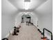 Spacious bonus room with exercise equipment, natural light, offering space for a home gym or recreation area at 6730 Gold Wagon Ln, Mint Hill, NC 28227