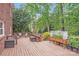 Expansive wooden back deck offers ample space for outdoor living and gardening at 6730 Gold Wagon Ln, Mint Hill, NC 28227